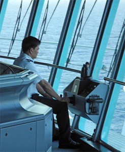 Cruise ship Quartermaster (Helmsman) on the bridge